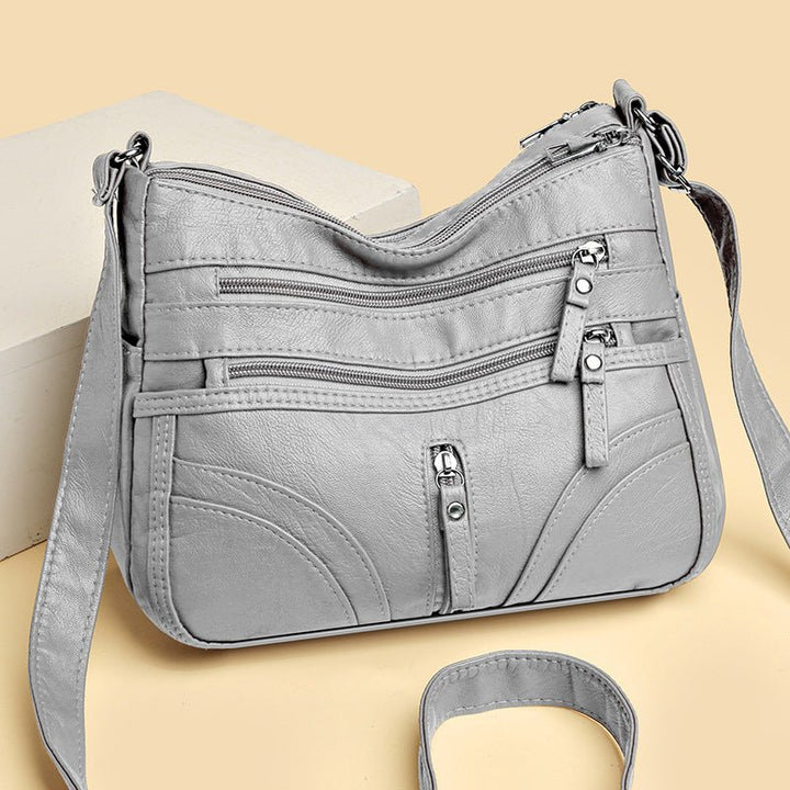 Modische Vintage Handtasche für Damen, perfekt als Umhängetasche für Freizeit und den urbanen Alltag.