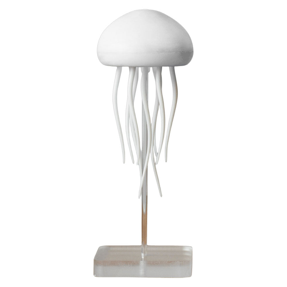 "Mehrfarbige Nachtlampe mit schwimmenden Quallen für beruhigendes Licht und entspannende Atmosphäre im Raum."