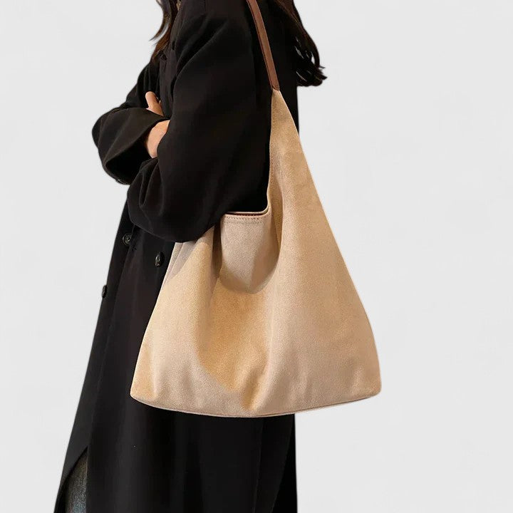 Elegante beige Umhängetasche für Damen, minimalistisch und komfortabel, perfekt als Alltagstasche.