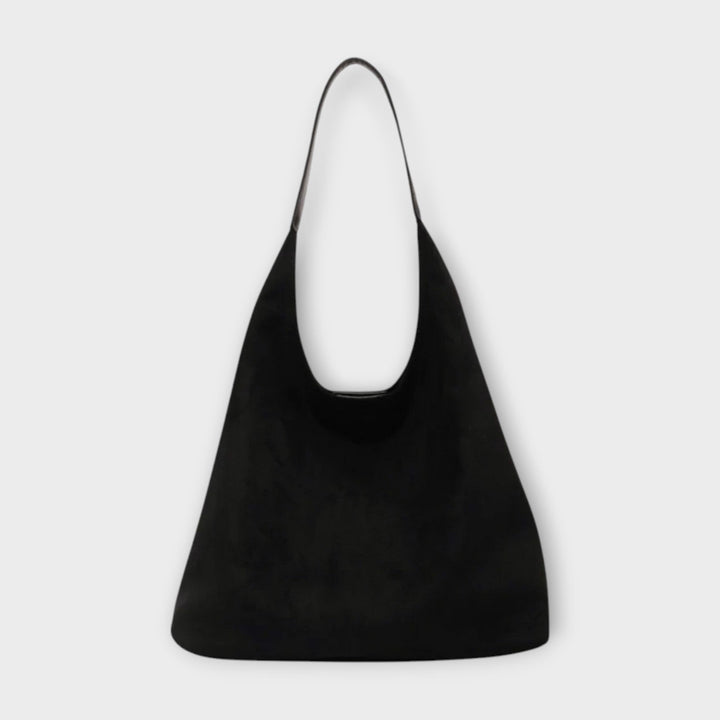 Elegante cremefarbene minimalistische Damen-Schultertasche, vielseitiges Accessoire für Sommer und City-Trips.