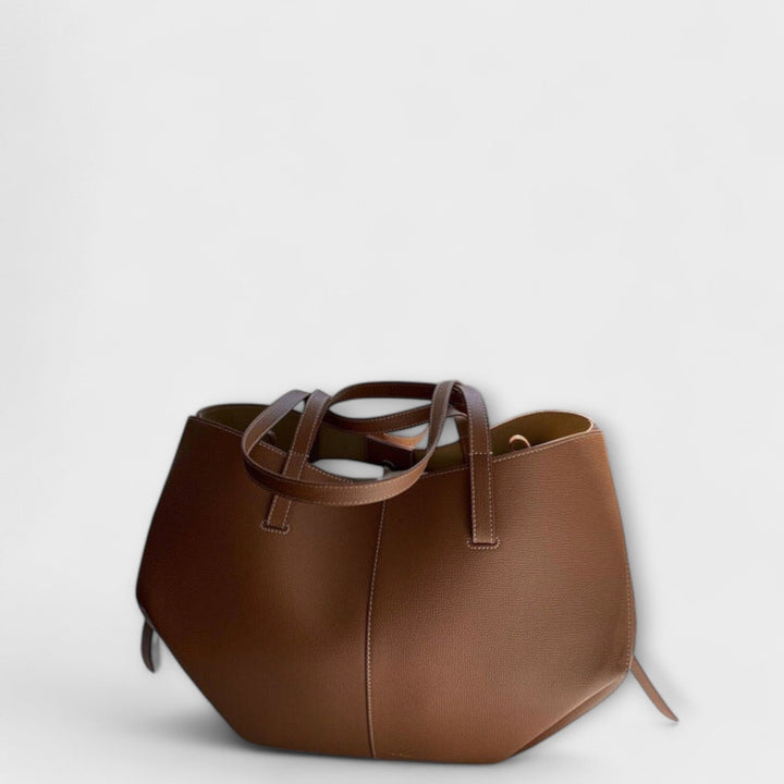 Moderne Damen-Handtasche in eleganter Form, perfekt als stilvolle Alltagstasche für Frauen.