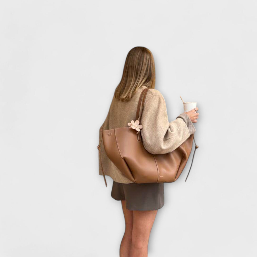 Schwarze elegante Damen-Handtasche mit stilvollem Design, eine funktionale Alltagstasche für Frauen.