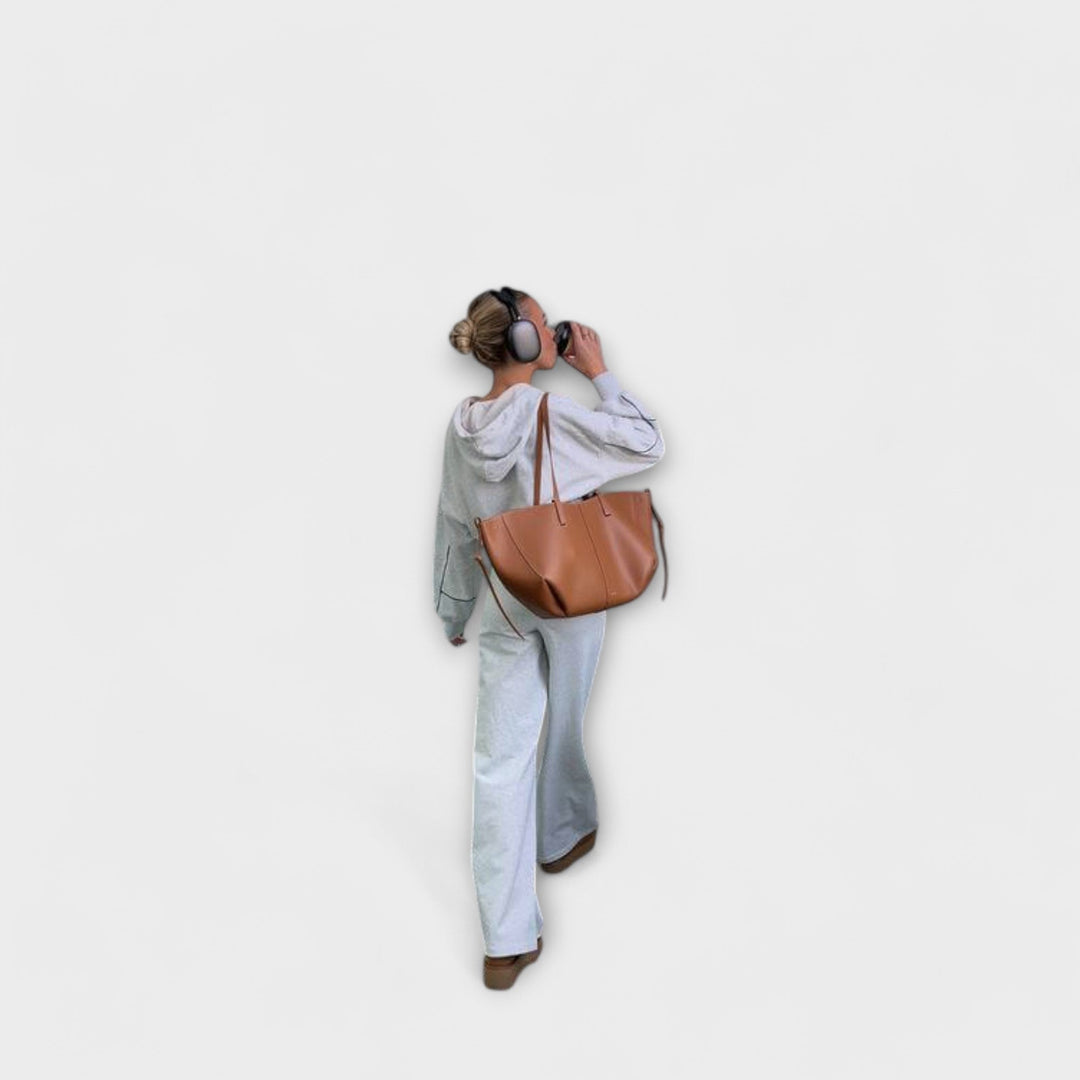 Taupefarbene Damen-Handtasche, modern und schick, ein vielseitiges Accessoire für Sommer und Alltag.