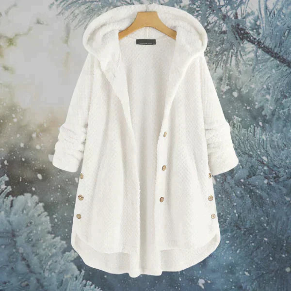 Komfortable Damen-Winterjacke mit Kapuze. Eine alltagstaugliche Freizeitjacke, warm und schützend.