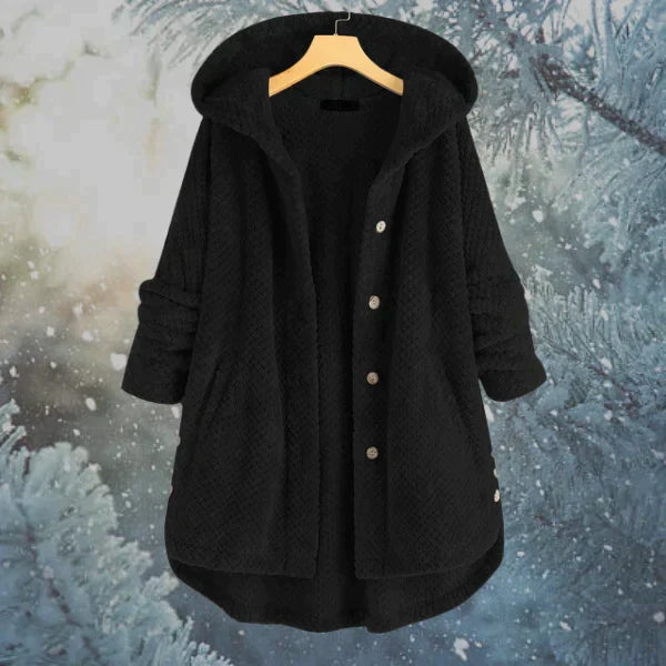Hochwertige Damen-Winterjacke mit Kapuze, bietet optimalen Kälteschutz. Eine moderne Wintermantel-Alternative.