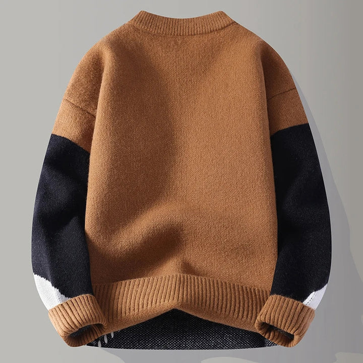 Stylischer Herren Winterpullover mit geometrischem Color-Blocking und strukturiertem Design. Ideal für Freizeit und Büro.
