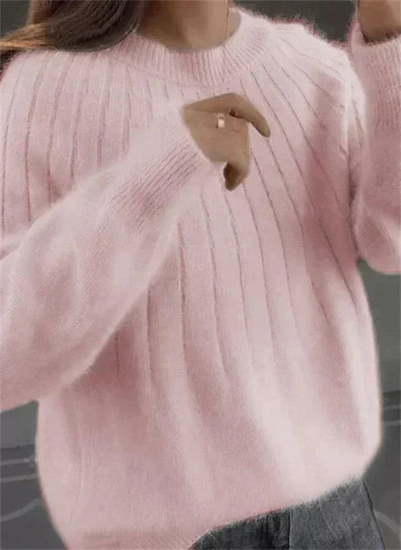 Eleganter Damen Winterpullover aus Strick. Perfekt für die kalte Jahreszeit und einen modernen, warmen Stil.
