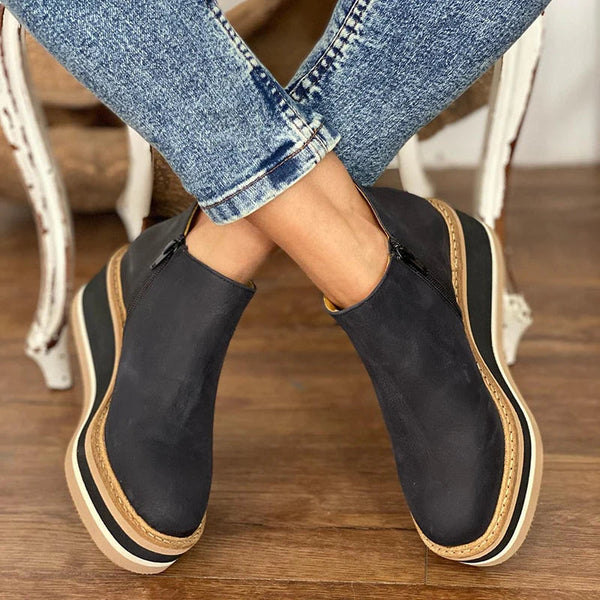 Bequeme Keilabsatz-Stiefeletten für Damen: Ein vielseitiger Komfortschuh, ideal für Alltag und Anlässe.