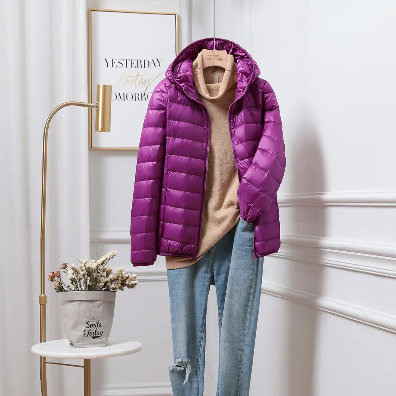 Hochwertige Damen Pufferjacke, mit Kapuze & leichter Fütterung. Die ideale Oberbekleidung.