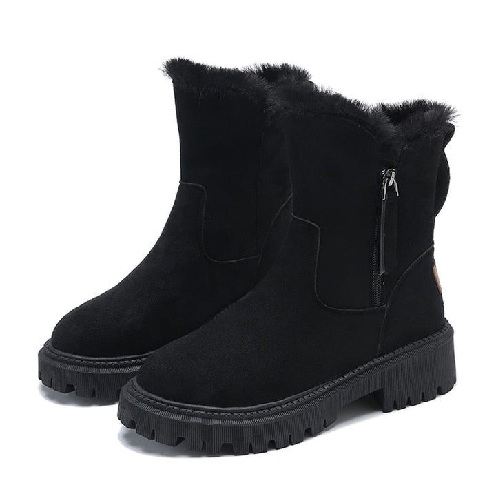 Bequeme warme Damen Knöchel-Schneestiefel in Schwarz, ideal für Wintermode. Rutschfeste Winterstiefel für Damen.