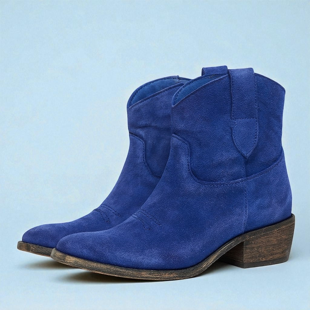 Trendige Damen-Stiefeletten im Western-Stil mit bequemem Blockabsatz für den Winter.