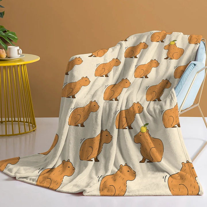 Orange Capybara Flanell-Fleece Wurfdecke. Kuschelige Fleecedecke mit niedlichem Tiermotiv für Sofa & Bett.