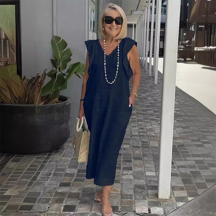 Elegantes Damen Sommerkleid mit V-Ausschnitt und ärmellosem Design. Ideales Strandkleid oder Urlaubskleid.