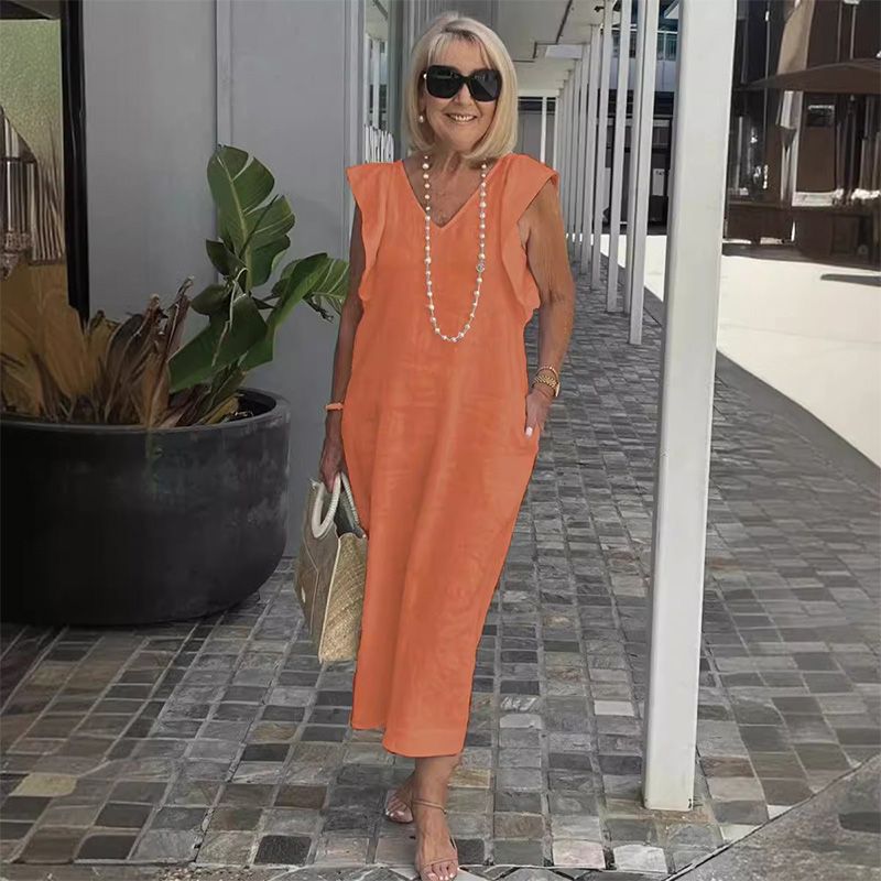 Lockeres, leichtes Damen Sommerkleid mit tiefem V-Ausschnitt. Ärmellos und bequem, perfekt für heiße Sommertage.