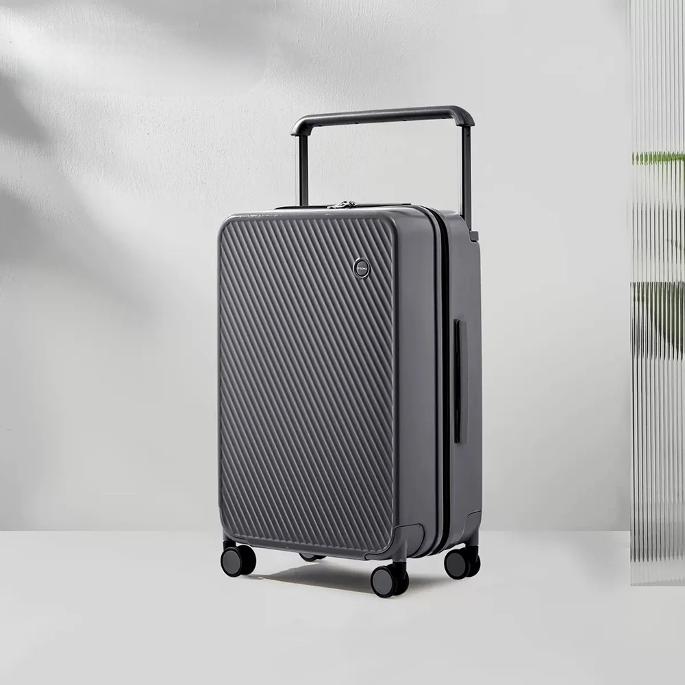 Handlicher Hartschalenkoffer mit breitem Griff, TSA-Schloss & 360°-Rollen für stressfreies Reisen.