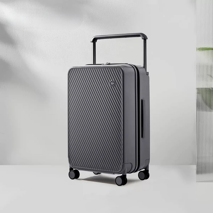 Handlicher Hartschalenkoffer mit breitem Griff, TSA-Schloss & 360°-Rollen für stressfreies Reisen.