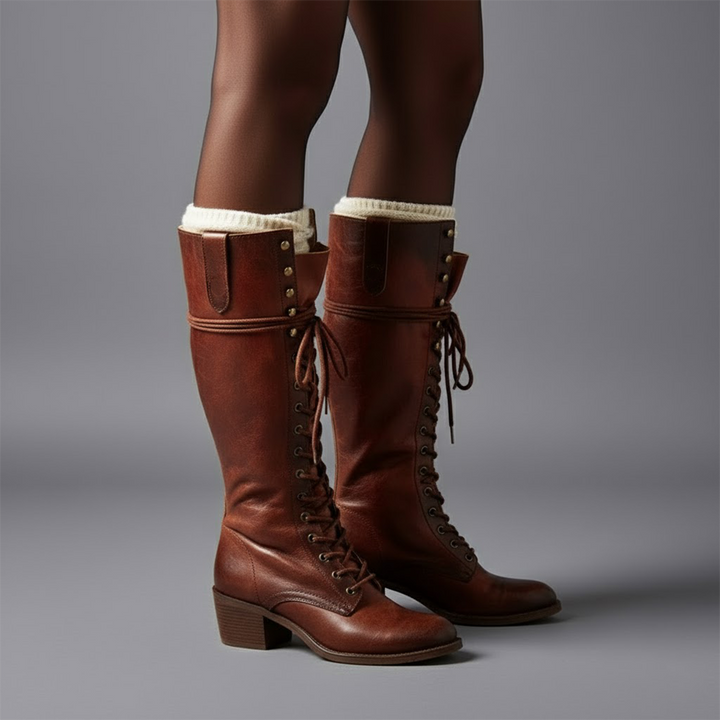 Robuste Damen Kniehochstiefel in Leder-Optik mit Schnürung und stabilem Blockabsatz. Stilvoll & bequem.