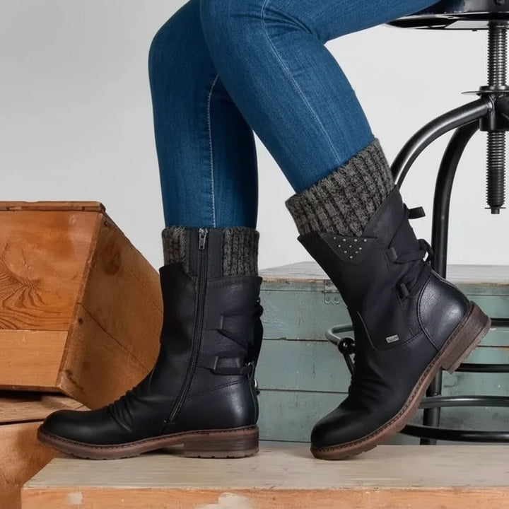 Schwarze Damen Winterschuhe, warm gefüttert & rutschfest. Bequeme Outdoor-Stiefel für kalte Tage.