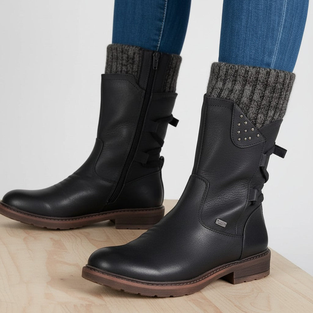 Blaue gefütterte Damen Winterstiefel mit rutschfester Sohle. Komfortschuhe für Schnee und Outdoor-Aktivitäten.