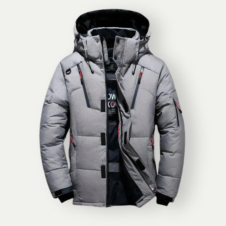 Graue, leichte Herren Daunenjacke. Wasserabweisend & warm, perfekt für Outdoor-Aktivitäten.