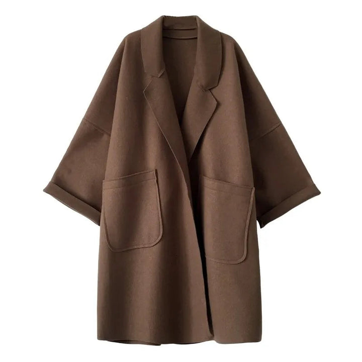 Schwarzer Damen Oversize Trenchcoat, elegant & stilvoll für die Übergangszeit. Ein Must-have für Damenmode.