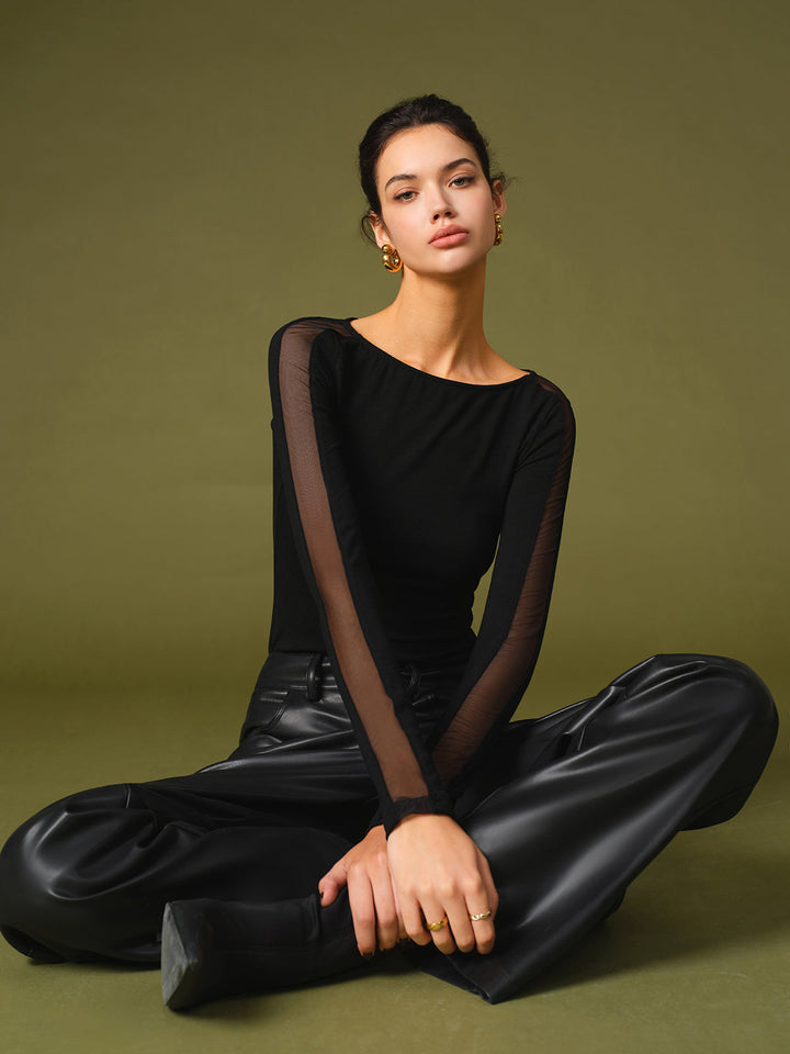 Modisches Damen T-Shirt, schwarz, mit bequemen Mesh-Ärmeln. Vielseitiges Oberteil für Frühling und Übergang.