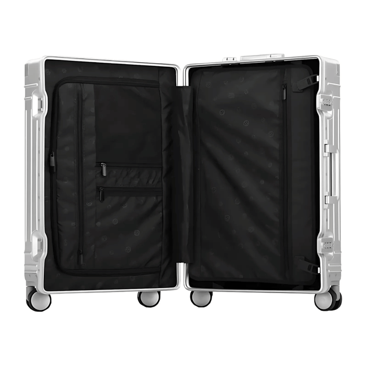 Großer Aluminium-Reisekoffer in Silber, ideal als Aufgabegepäck für lange Urlaubsreisen.