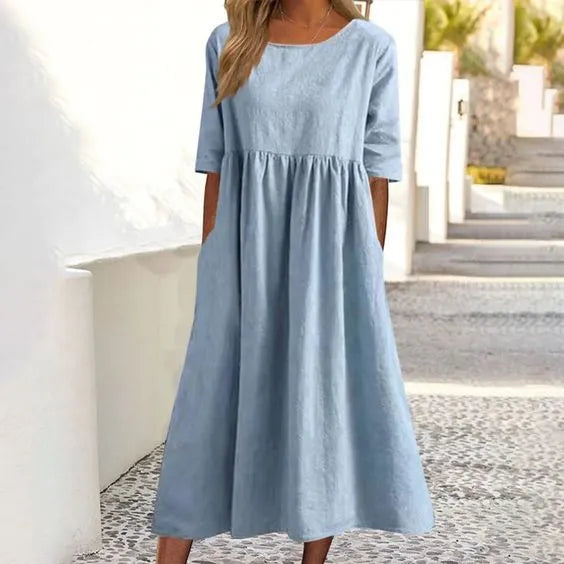 Stilvolles Damen Sommerkleid mit lockerem Schnitt, Rundhals und kurzen Ärmeln. Mit Taschen.