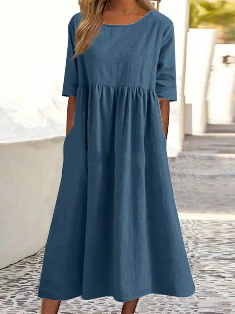 Bequemes Damen Kurzarmkleid, Rundhalsausschnitt und seitlichen Taschen. Ideal als Alltagskleid.
