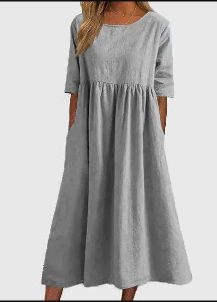 Vielseitiges Damenkleid mit Kurzarm, Rundhals und Taschen. Perfekt für Frühling & Sommer.