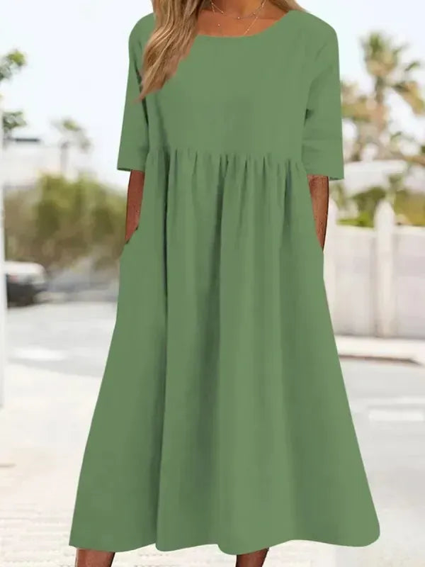Schickes Damen Freizeitkleid, Rundhals, Kurzarm, mit Taschen. Ideal für entspannte Tage.