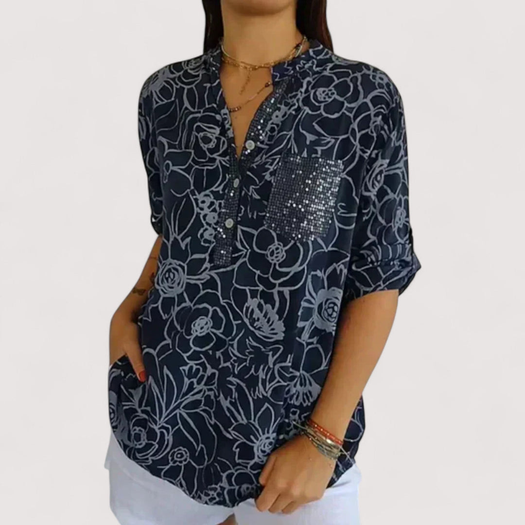 Moderne Damenbluse mit floralem Muster, atmungsaktiv & leicht für höchsten Tragekomfort im Sommer.