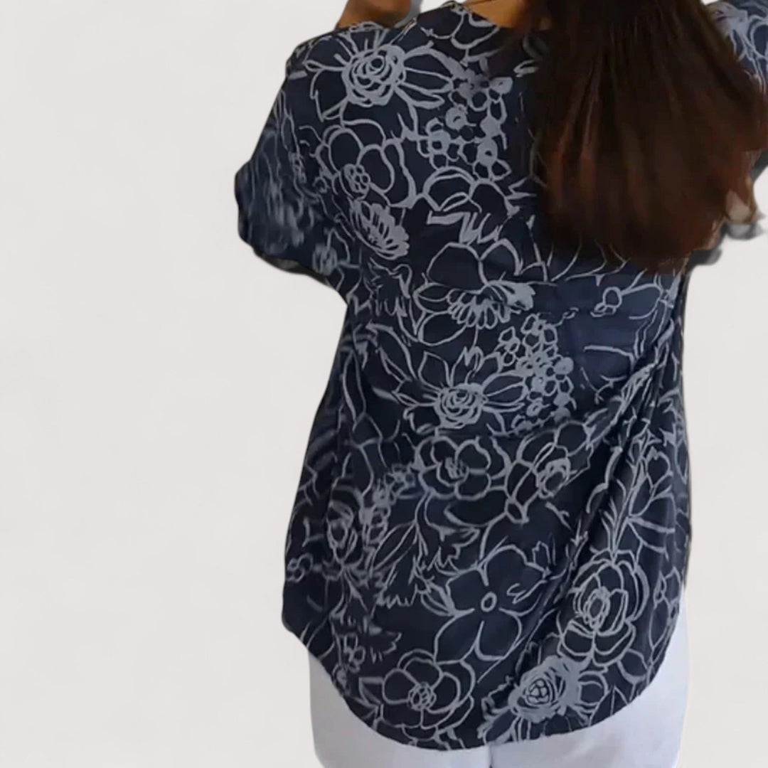 Stylische Damenbluse mit floralem Design & lockerem Schnitt, ideal für elegante Sommer- und Freizeitlooks.