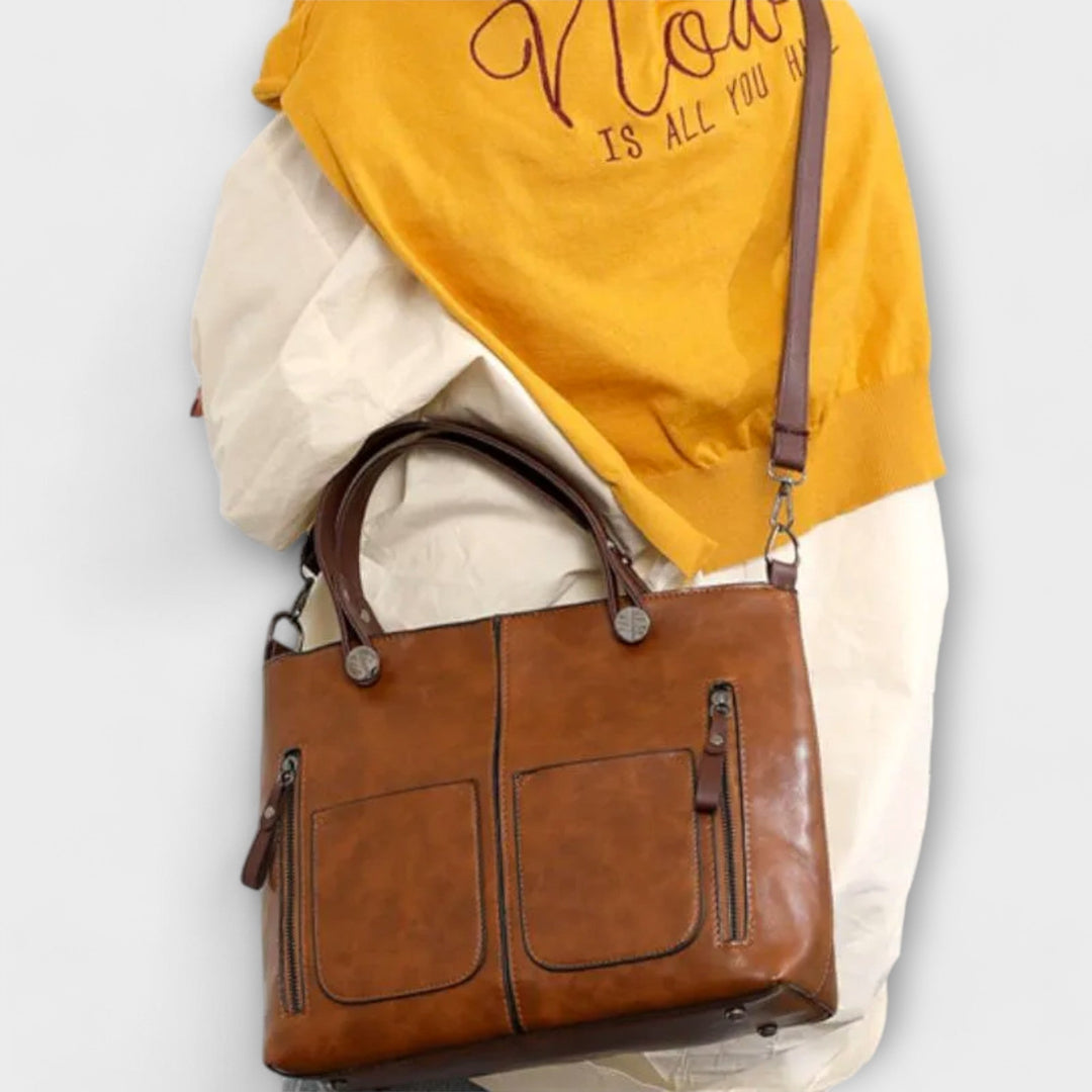 Elegante braune Damen-Handtasche für den täglichen Gebrauch. Eine funktionale Schulter- & Crossbody-Tasche.