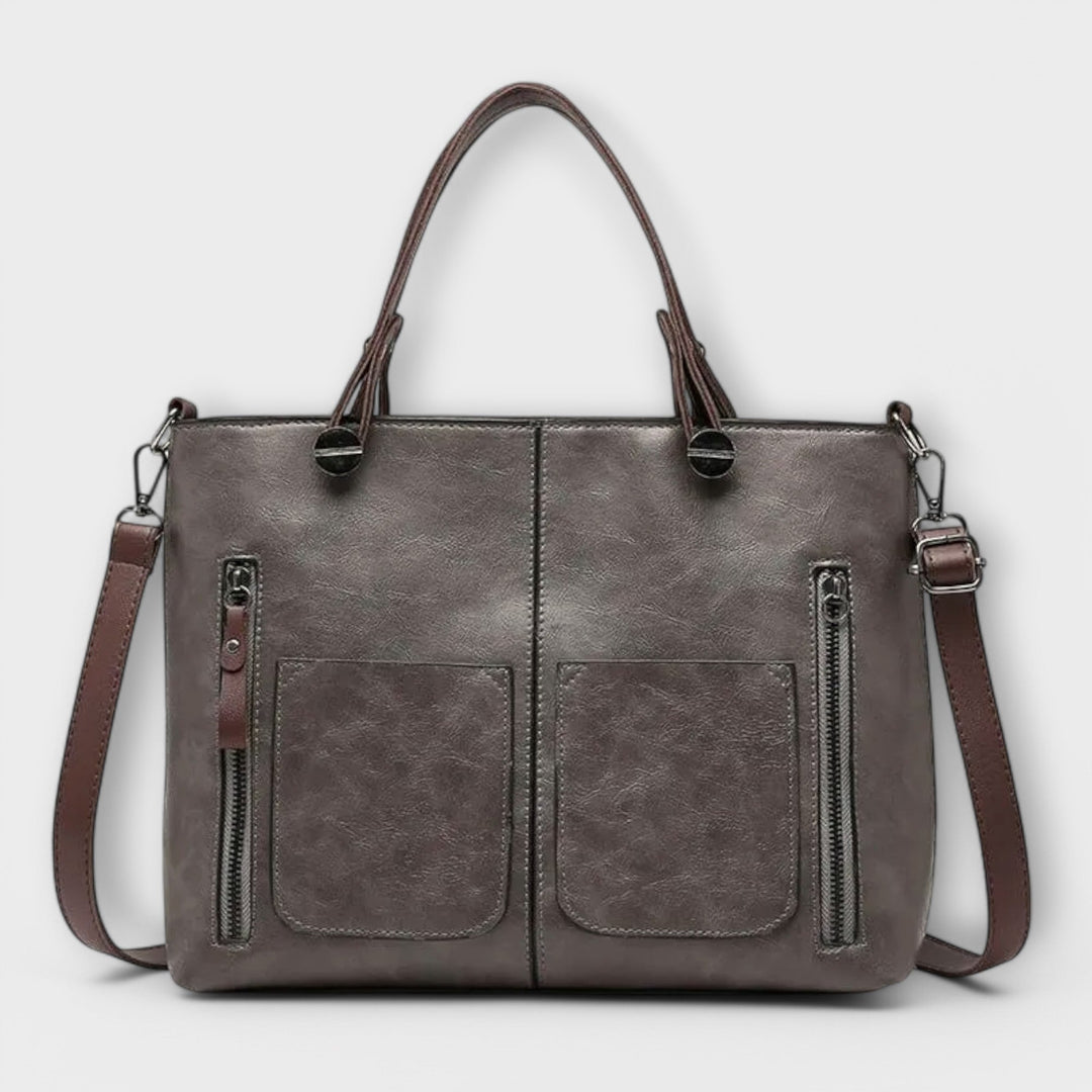 Damen-Handtasche im stilvollen Design. Perfekt als Schulter- oder Crossbody-Tasche für moderne Frauen.