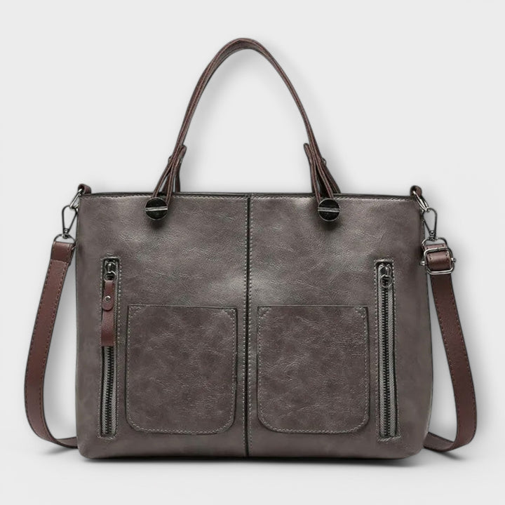 Damen-Handtasche im stilvollen Design. Perfekt als Schulter- oder Crossbody-Tasche für moderne Frauen.