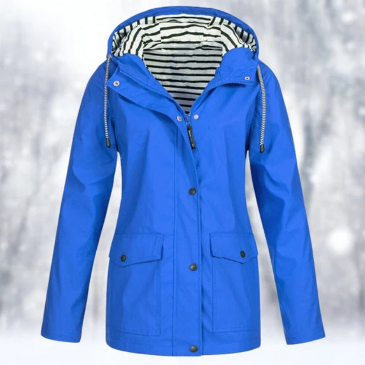 Damen Outdoor-Regenjacke mit schützender Kapuze. Wasserdicht & komfortabel für kalte Tage im Winter.