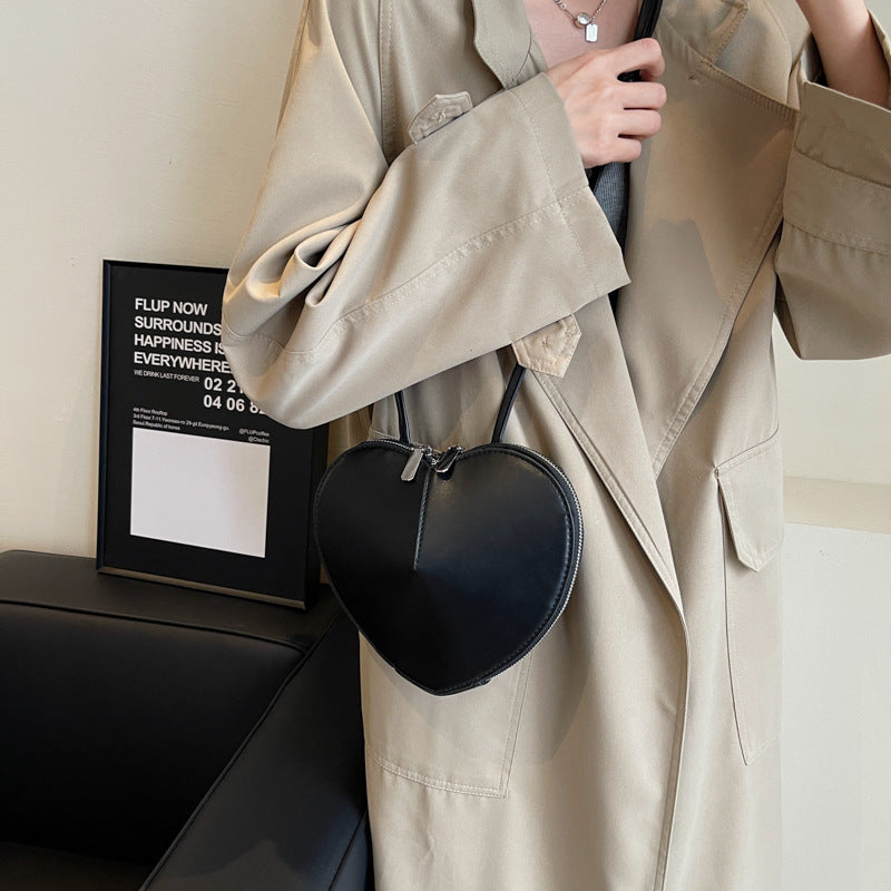 Elegante Damen Schultertasche, ideal als modisches Accessoire. Vielseitig als Umhängetasche tragbar.