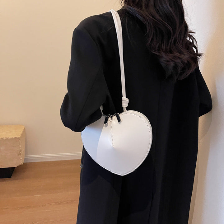 Praktische Damen Umhängetasche für freihändiges Tragen. Ideale Crossbody Tasche für unterwegs & Alltag.