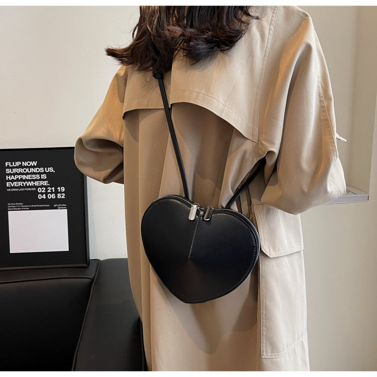 Modische Damen Umhängetasche mit sicherem Reißverschlussfach hinten. Bequeme Crossbody Tasche.