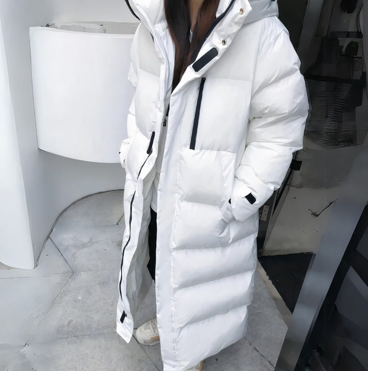Warme, lange Damen Winterjacke, wasserdicht und winddicht, mit Kapuze und schützendem Futter für kalte Tage.