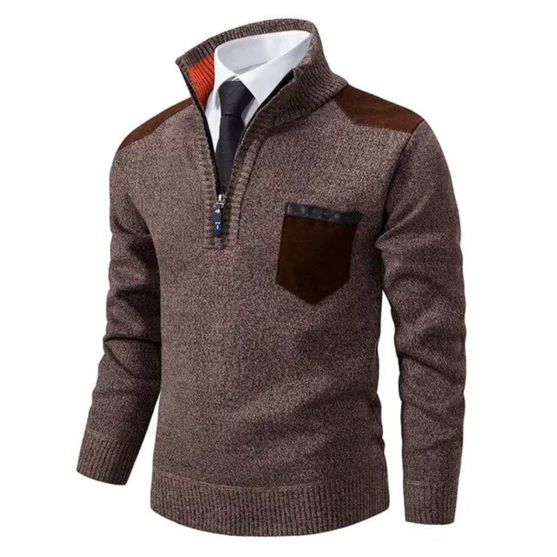 Eleganter Herrenpullover mit praktischer Brusttasche & schickem Viertelreißverschluss. Layering-tauglich.