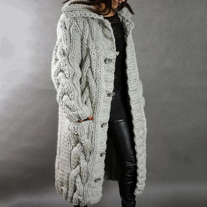 Eleganter Damen Strickmantel, ideal als Winterjacke. Bietet Wärme & Komfort, perfekt für Herbst & Winter.