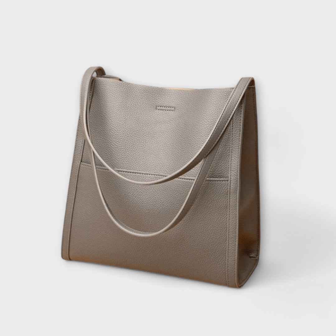 Stilvolle Damenhandtasche mit Struktur, modernes Design, vielseitig einsetzbar für den Alltag.