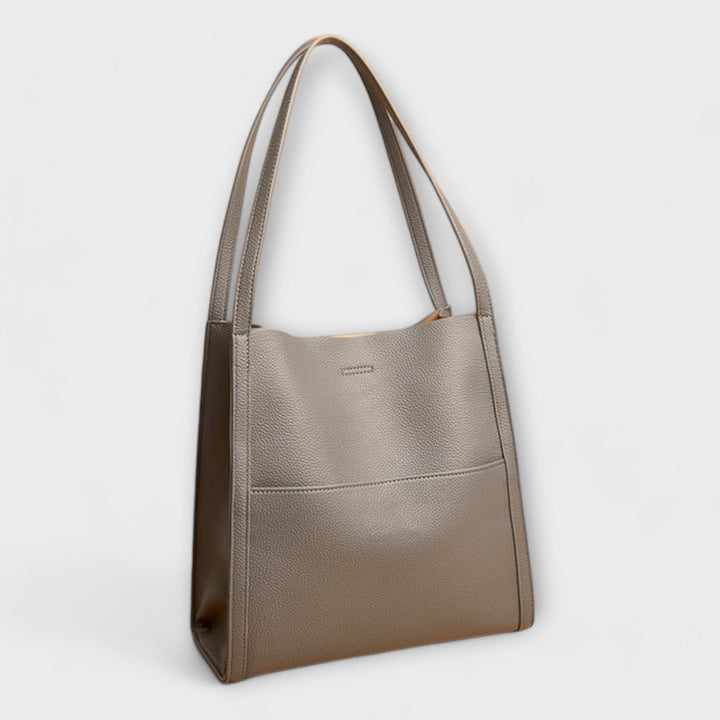 Damenhandtasche strukturiert, stilvolles Accessoire für moderne Frauen im Alltag & Sommer.