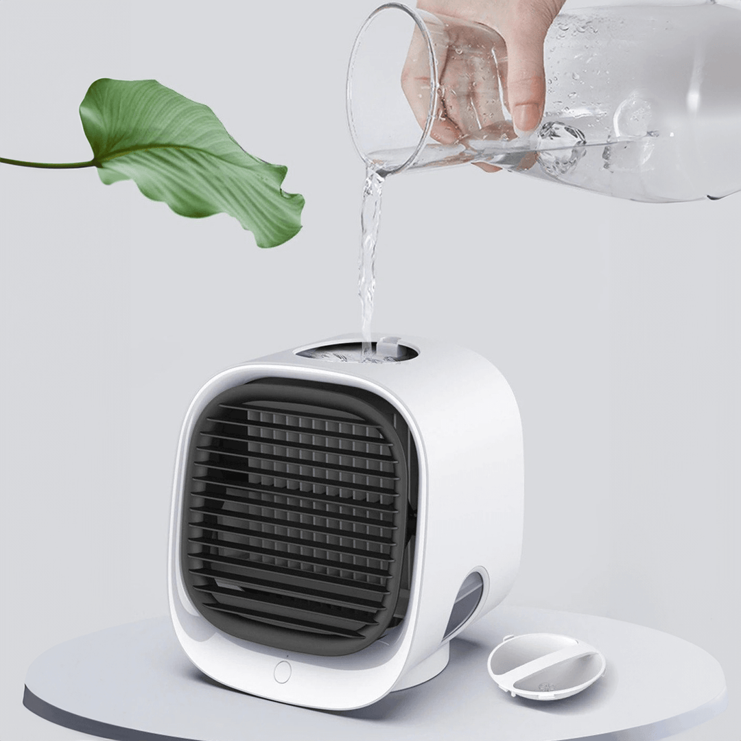 Elegante tragbare Mini-Klimaanlage mit USB-Anschluss, sorgt für kühle Luft am Arbeitsplatz oder zu Hause.