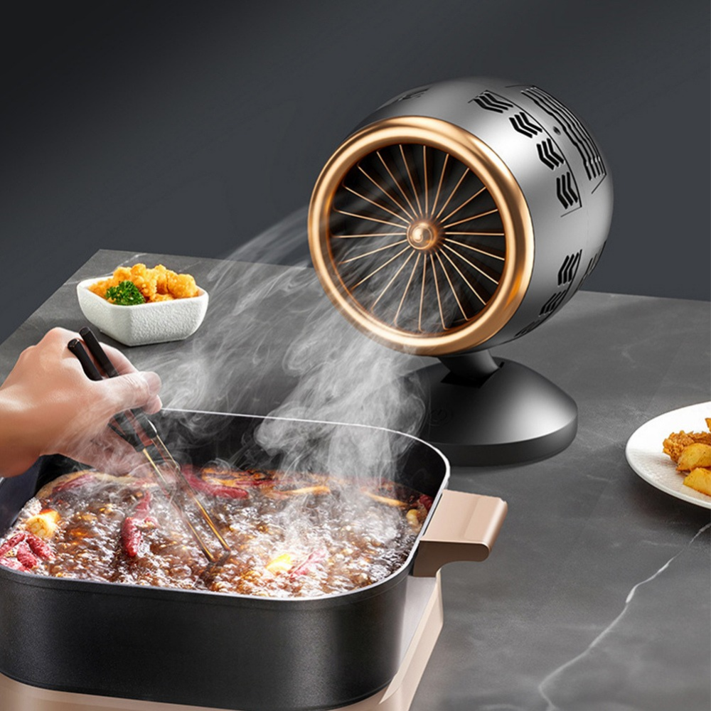 Kompakter Dunstabzug Ventilator für Kochinseln und Tische, beseitigt effektiv Rauch und Gerüche beim Kochen.