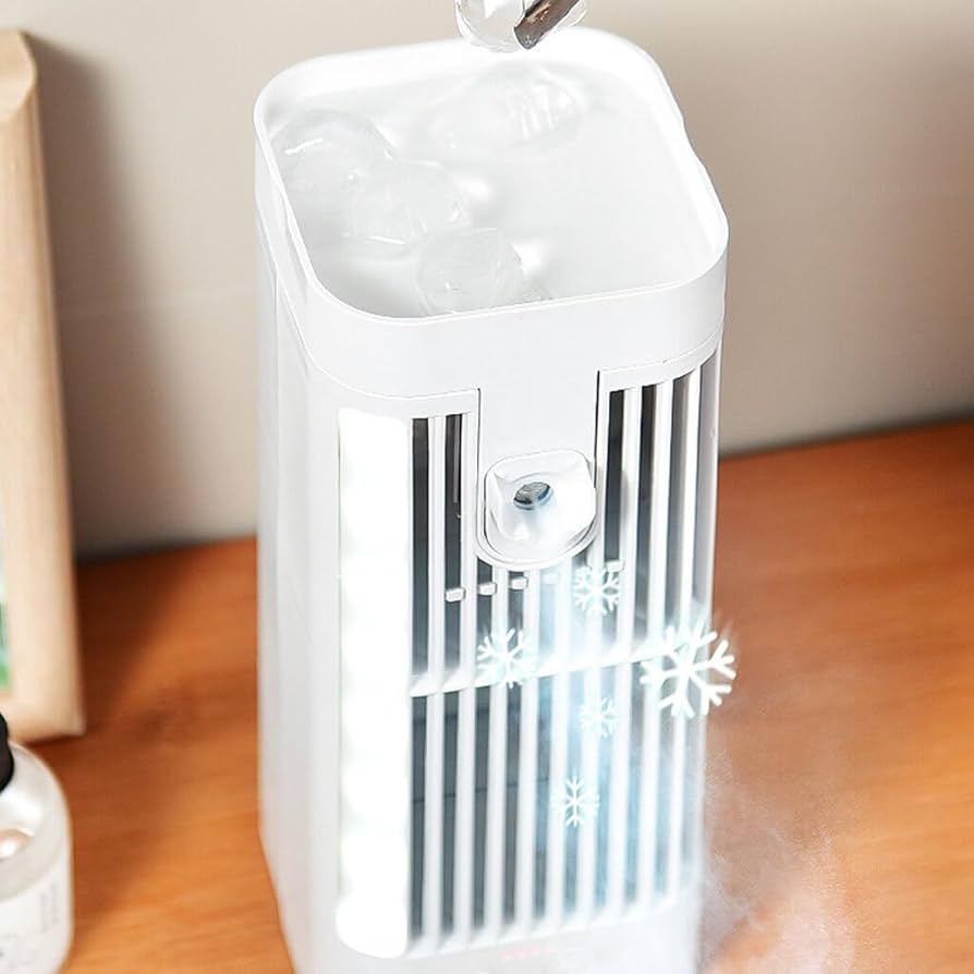 Effektiver Kühlventilator & Sprühnebel Befeuchter, tragbar, USB-betrieben, 3 Geschwindigkeiten für angenehme Frische.