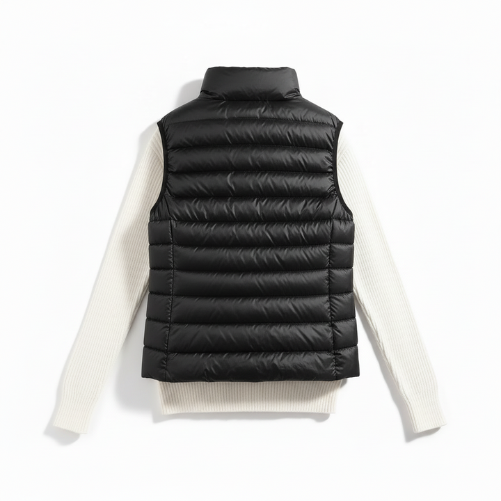 Warme Daunenweste für Damen, gesteppt und winddicht, ideal als bequeme Winterweste oder Freizeitkleidung.