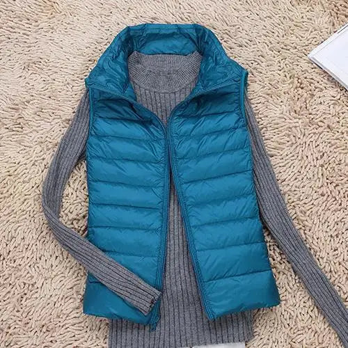 Modische Damen Daunenweste, ultraleicht und warm, ideal als Schicht für Übergang oder milden Winter.
